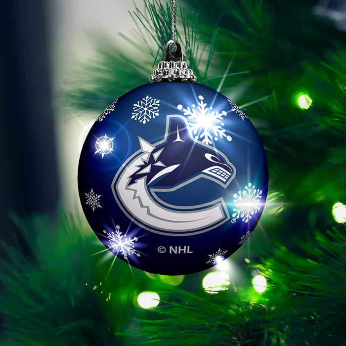Vancouver Canucks Ball Ornament hanging on Christmas tree